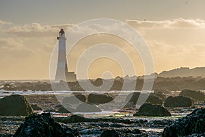 Beachy Head lighthouse at low tide.