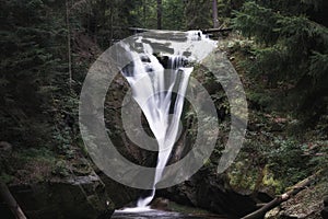 September in Karkonosze, waterfall on a mountain river, cascade