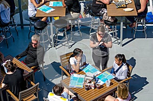 Working waitress at outdoor cafe