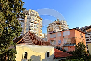 September 09 2023 - Tirana, Albania: Typical buildings and streetlife in the city centre of the albanian capital photo