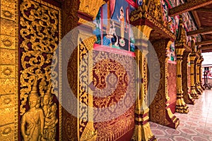 September 20, 2014: Walls of Wat Manorom temple in Luang Prabang photo