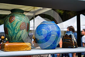 September 4, 2017 Woodside/CA/USA - Handcrafted colorful flower vases displayed at the Kings Mountain Art Fair located on Skyline