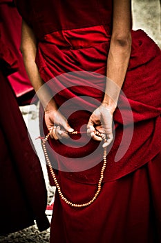 Sera Monastery Debating Monk wit beads, Lhasa Tibet