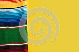 Serape on yellow background.