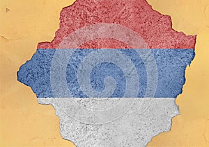 Serb Republicstate BiH flag in big concrete cracked hole