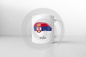 Serbia flag on white coffee mug.