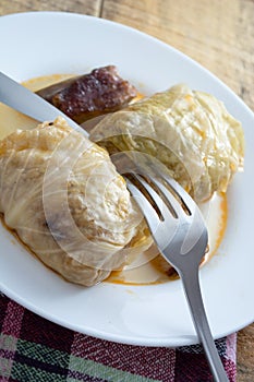 Serbian dish sarma served in white plate