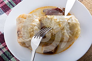 Serbian dish sarma served in white plate