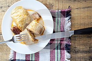 Serbian dish sarma served in white plate