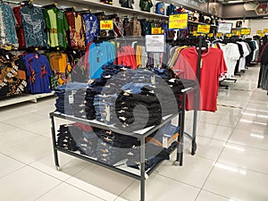 Various types of clothes are being sold in supermarkets.