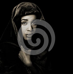 Serene African American woman wearing a shawl in monochrome