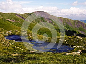 Serene Beauty: Mountain Landscape with Small Blue Lake in Saint-Sorlin-d& x27;Arves, Savoie