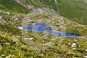 Serene Beauty: Mountain Landscape with Small Blue Lake in Saint-Sorlin-d& x27;Arves, Savoie