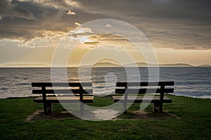 Serene bench offers a solitary spot to contemplate the sea