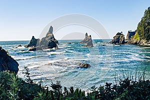 Serene Coastal Beauty with Clear Skies and Majestic Rock Formations