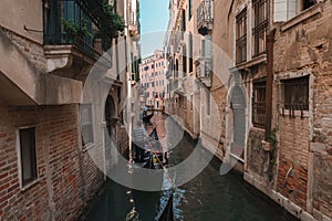 Serene Gondola Ride Through Charming Venetian Canals - Iconic Waterway Scene