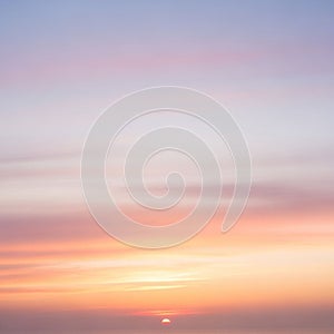Wispy clouds stretch across the sky adding texture and depth to the scene