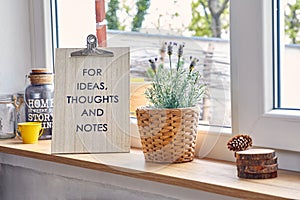 Serene Inspiration: Lavender Blooms and a Wooden Sign for Ideas, Thoughts, and Notes in a Cozy Home