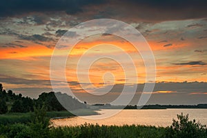 Serene landscape with a lake lake in the evening