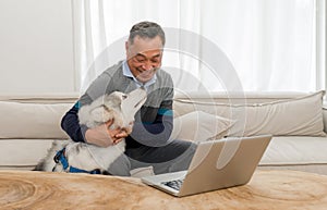 A serene man sharing a tranquil moment with his faithful dog on a cozy couch