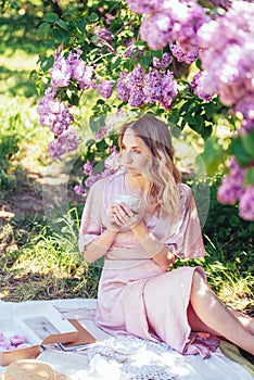 Serene Moment Under Lavender Lilac Blooms in Springtime.