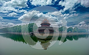 Serene Reflections of the Watchtower at the Forbidden City Moat, Beijing