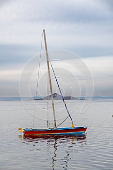 Serene Sailboat on Calm Waters at La Manga, Spain photo