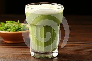 Serene setting with matcha green tea latte in glass cup, wellness and healthy lifestyle concept