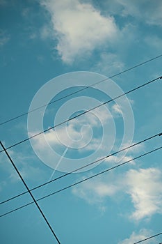 Skyline with Power Lines and Contrail photo