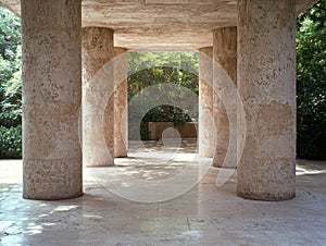 Serene stone columns in lush forest setting