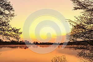 Serene Sunrise at the Lake