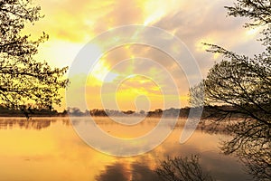 Serene Sunrise at the Lake