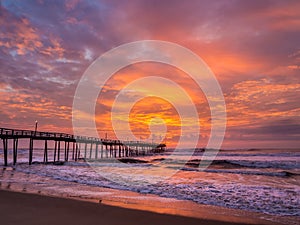 Sunrise over fishing pier at North Carolina Outer Banks