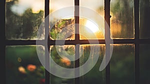 Serene Sunset Through a Rustic Window with Glass Reflections
