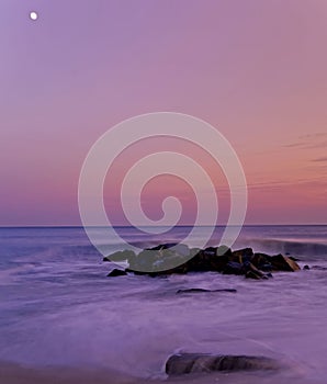 Serene twilight view of a ocean shore