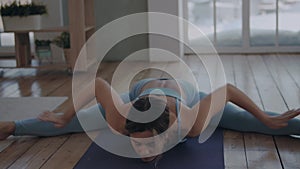 Serene Woman Doing Yoga On Mat At Her Home