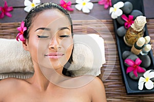 Serene woman enjoying in spa treatment
