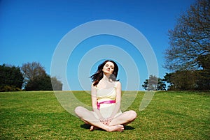 Serene woman in field