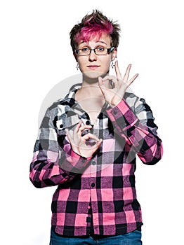 Serene Woman making hand gesture ok sign