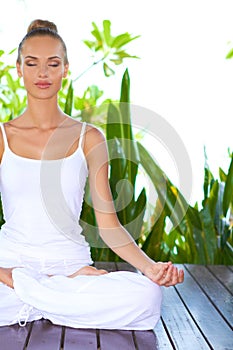 Serene woman meditating