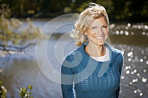 Serene Woman Smiling At The Park photo