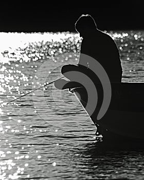 Serenity : Boy Fishing on Lake, BW