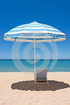 Serenity by the Sea: Striped Sun Umbrella on a Golden Sandy Beach