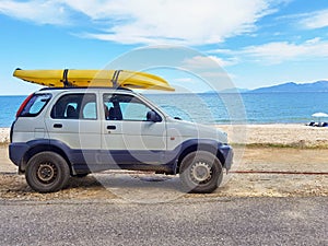 Serfing car by the sea and beach in preveza greece