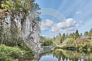 Serga River. Holey rock. Summer nature landscape. Nature park Deer streams, Russia.