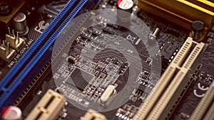 A series of 4K close up, slider shots of the surface of computer hardware parts, chips,motherboard,curcuits