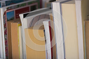 A series of books viewed from the side