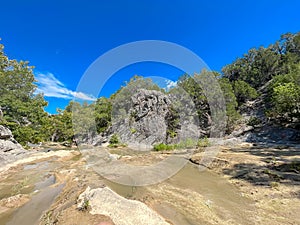 Series of cascades at Bridal Veil Falls, where Honey Creek feeds scenic waterfall Turner Falls in David, Oklahoma, USA, lacy