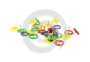 Series of colorful thumbtacks isolated on a white background. Decorative thumbtacks in yellow, red, green, and blue colors