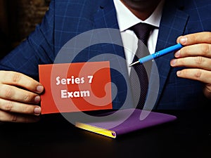 Series 7 Exam inscription on red business card